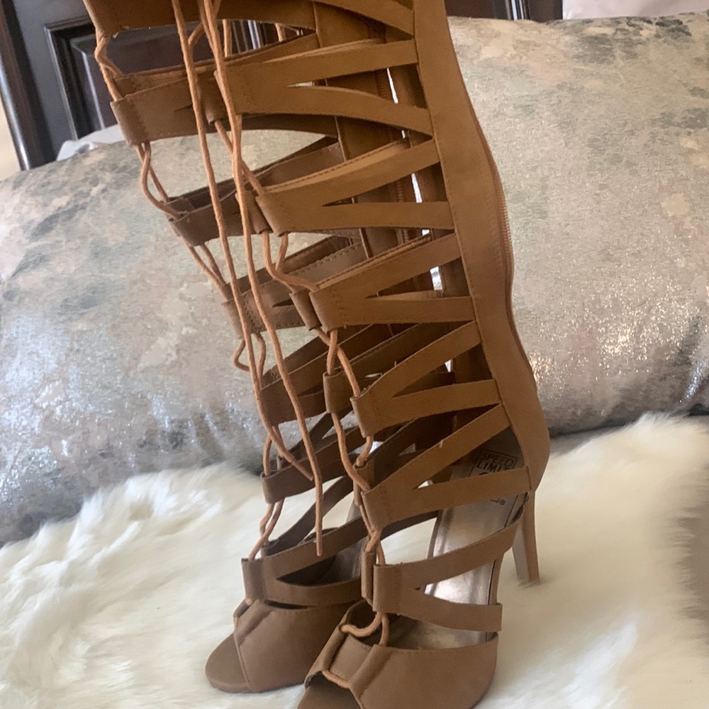 Knee high heel sandals